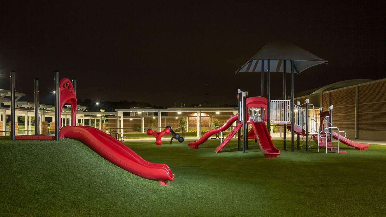 Nighttime artificial turf playground by Southwest Greens Northern CA West